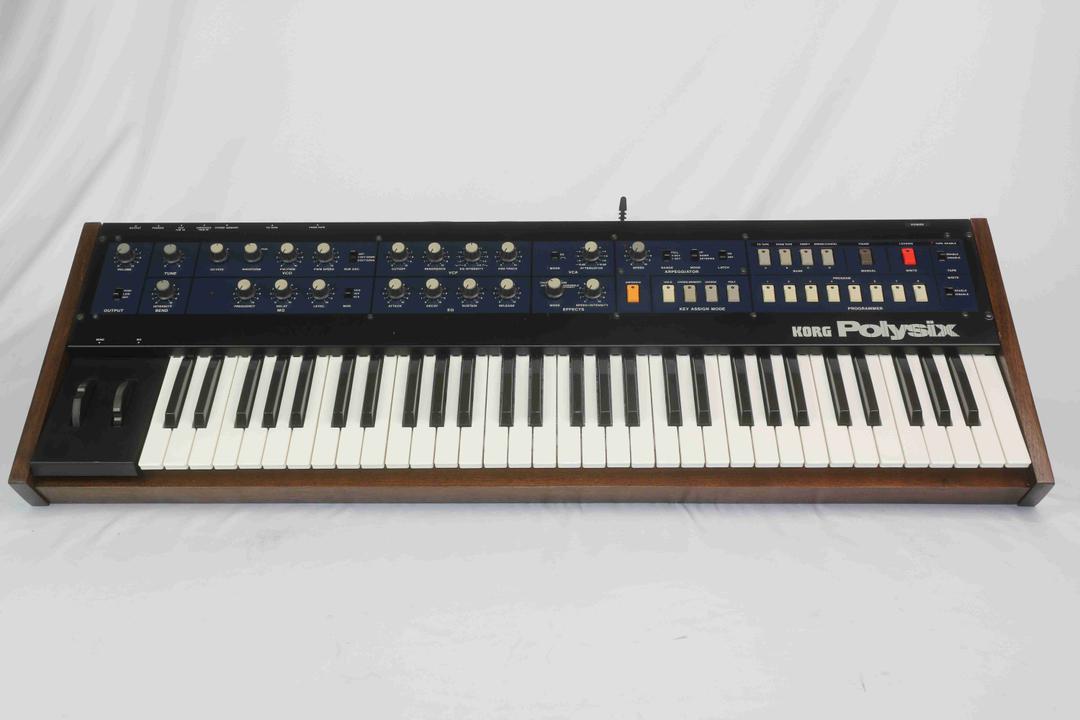 Korg -  Polysix in solid walnut case (serviced)
