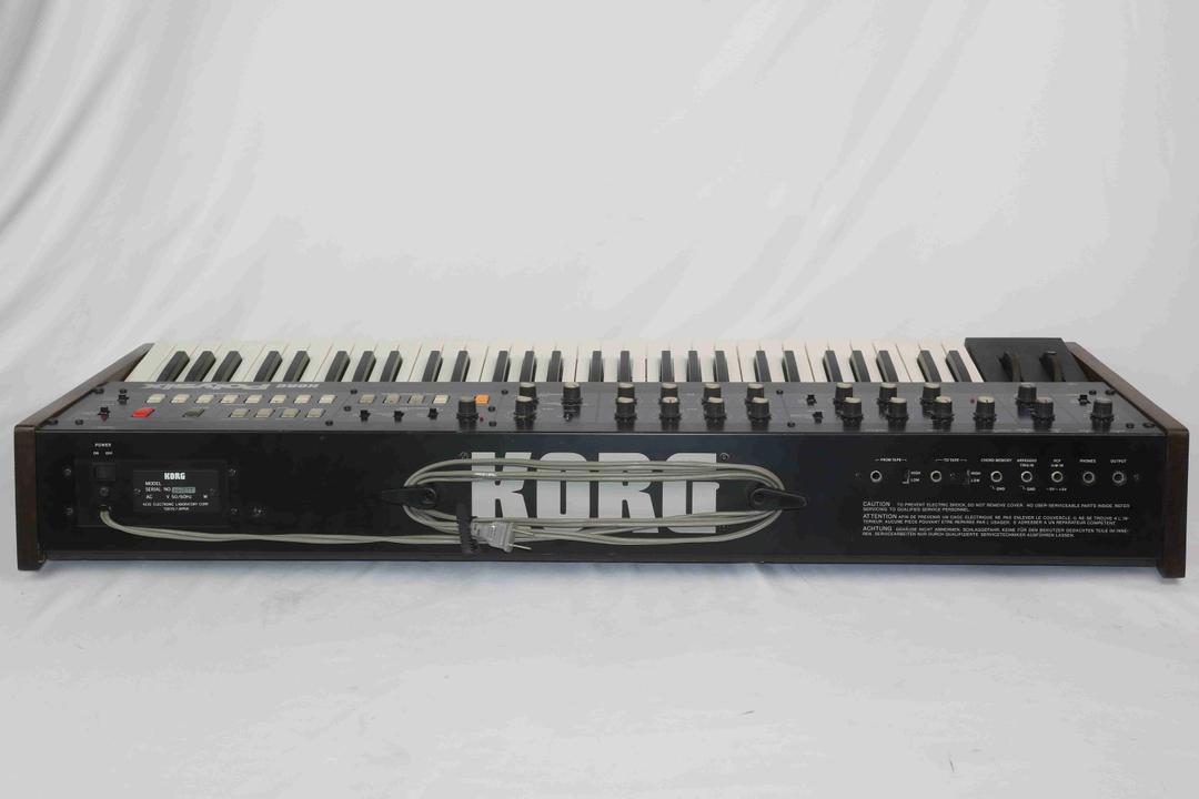 Korg -  Polysix in solid walnut case (serviced)